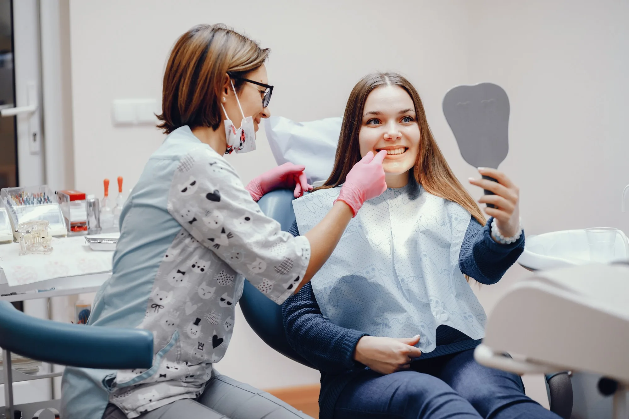 Bright dental clinic treatment room with greenery view